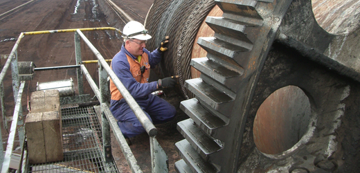 Staff working on machinery