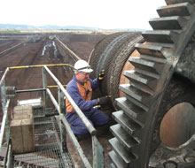 Staff working on machinery