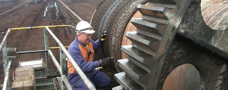 Staff working on machinery